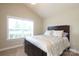 Bedroom with bed, carpet, and a bright window at 3523 Brickwood Cir, Midland, NC 28107