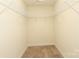 Spacious walk-in closet with shelving for ample storage at 3523 Brickwood Cir, Midland, NC 28107
