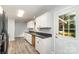 The kitchen boasts granite counters, modern cabinets, and exterior access to the backyard at 3884 Snider Cir, Hickory, NC 28602