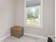Bright bedroom with a large window offering plenty of natural light and neutral-colored carpet at 3965 Hemingway Dr, Hickory, NC 28601