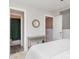 Cozy bedroom with an ensuite bathroom, table, and neutral decor at 3965 Hemingway Dr, Hickory, NC 28601