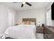 Well-lit bedroom with neutral tones, plush bedding, and modern furniture at 3965 Hemingway Dr, Hickory, NC 28601