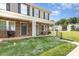 Exterior view of townhouses featuring stone accents, inviting front porches, and well-maintained lawns at 3965 Hemingway Dr, Hickory, NC 28601