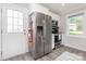 Close up of the stainless steel refrigerator and door in the well-lit modern kitchen at 3965 Hemingway Dr, Hickory, NC 28601