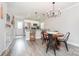 Modern kitchen with stainless steel appliances, breakfast bar, and updated lighting fixtures at 3965 Hemingway Dr, Hickory, NC 28601