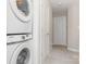 Laundry area with stacked washer and dryer hookups and nearby hallway closet at 3965 Hemingway Dr, Hickory, NC 28601