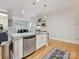 Eat-in kitchen area with stainless steel appliances and hardwood floors at 404 N Laurel Ave # 11, Charlotte, NC 28204
