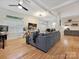 Open living room boasts natural light, hardwood floors and modern decor at 404 N Laurel Ave # 11, Charlotte, NC 28204