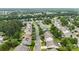 Overhead view of a quiet neighborhood street, lined with trees and well-kept homes at 424 Paperbark Ln, Rock Hill, SC 29732