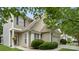 Charming home with tan siding, green bushes, and a well-maintained front yard at 424 Paperbark Ln, Rock Hill, SC 29732