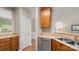 Spacious kitchen area with a built-in counter and stainless steel dishwasher at 424 Paperbark Ln, Rock Hill, SC 29732