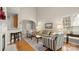 Spacious living room with hardwood floors, large windows, and comfortable seating at 424 Paperbark Ln, Rock Hill, SC 29732