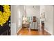 View into the light and airy living room with tall ceilings and hardwood floors at 424 Paperbark Ln, Rock Hill, SC 29732