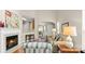 Bright living room with a fireplace, wood floors, and an open layout at 424 Paperbark Ln, Rock Hill, SC 29732