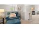 Upstairs loft featuring an armchair and ottoman, plus bookshelves and decor at 424 Paperbark Ln, Rock Hill, SC 29732
