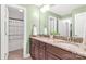 Bathroom with dual sinks, granite countertops, and wood cabinets at 481 Evergreen Rd, Clover, SC 29710