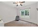 Bedroom with carpeted floors, neutral walls, and large window at 481 Evergreen Rd, Clover, SC 29710