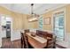Elegant dining room features hardwood floors, crown molding, and a stylish chandelier for sophisticated meals at 481 Evergreen Rd, Clover, SC 29710