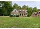Beautiful single-Gathering home boasting a large, verdant front yard and a picturesque, tree-lined backdrop at 481 Evergreen Rd, Clover, SC 29710