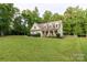 Beautiful single-Gathering home boasting a large, verdant front yard and a picturesque, tree-lined backdrop at 481 Evergreen Rd, Clover, SC 29710