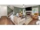 Spacious living room with hardwood floors, fireplace, and staircase at 481 Evergreen Rd, Clover, SC 29710