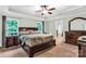 Main bedroom with trey ceiling, windows, and ensuite bathroom at 481 Evergreen Rd, Clover, SC 29710