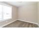 Bedroom featuring neutral colors, carpet, and ample lighting at 515 Kings Mountain St, Clover, SC 29710