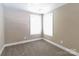 Bright bedroom featuring neutral tones, carpeted floors and windows that provide natural light at 515 Kings Mountain St, Clover, SC 29710