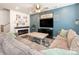 Cozy living room featuring a fireplace, stylish decor, and comfortable seating, perfect for relaxing at 5432 Kinsbridge Dr, Charlotte, NC 28227