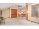 Versatile bonus room with neutral carpet and ample storage, perfect for customization at 6719 Love Point Rd, Denver, NC 28037