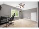 Bedroom featuring a ceiling fan and natural lighting at 7101 Weavers Run, Cramerton, NC 28032