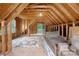 Bright bonus room ready for customization; features include exposed beams and ample natural light at 7101 Weavers Run, Cramerton, NC 28032
