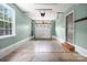 Bright two-car garage featuring painted walls and a garage door with windows at 7101 Weavers Run, Cramerton, NC 28032