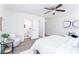 Comfortable bedroom with neutral tones and a glimpse of an en-suite bathroom, creating a calming retreat at 810 W Raleigh Ave, Statesville, NC 28677