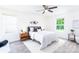 Serene bedroom featuring a comfortable bed, and a large window offering tranquil views of the surrounding nature at 810 W Raleigh Ave, Statesville, NC 28677