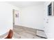 The hallway features light gray flooring, white walls, and access to other areas of the home at 810 W Raleigh Ave, Statesville, NC 28677