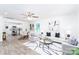 Bright open-concept living room with sleek decor and an adjoining kitchen and dining area at 810 W Raleigh Ave, Statesville, NC 28677