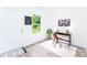 Study features a cozy work area with a sleek desk, comfortable chair, and an ample amount of natural light at 810 W Raleigh Ave, Statesville, NC 28677