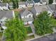 Charming two-story home with a well-maintained front yard and an attached garage in a suburban setting at 920 Old Forester Ln, Charlotte, NC 28214