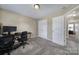Neutral bedroom with carpet, a closet, and desk with space for computer, great for an office or spare room at 920 Old Forester Ln, Charlotte, NC 28214