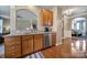 Functional kitchen featuring granite countertops and stainless steel appliances, flowing into dining area at 920 Old Forester Ln, Charlotte, NC 28214