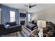 Comfortable living room boasts a fireplace, two sofas, accent pillows, and neutral colored carpet at 920 Old Forester Ln, Charlotte, NC 28214
