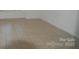 Ceramic tile floor in a room with white walls at 9501-A Shannon Green Dr, Charlotte, NC 28213