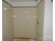 A tiled bathroom shower with coordinated accents at 9501-A Shannon Green Dr, Charlotte, NC 28213