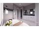 Bright bathroom featuring a soaking tub, glass-enclosed shower, dual sink vanity and modern fixtures at 0 Mineral Ln, Lincolnton, NC 28092