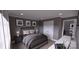 Comfortable bedroom with a plush bed, stylish decor, and bright natural light from large windows at 0 Mineral Ln, Lincolnton, NC 28092
