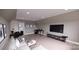 A large bonus room with a TV and work space at 0 Mineral Ln, Lincolnton, NC 28092