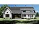 Charming home with inviting outdoor seating area and lush green lawn at 0 Mineral Ln, Lincolnton, NC 28092