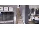 Welcoming foyer with hall tree with bench seating and stairs leading to upper level at 0 Mineral Ln, Lincolnton, NC 28092