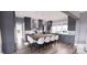 A modern kitchen with an island, complemented by stylish seating and contemporary lighting fixtures at 0 Mineral Ln, Lincolnton, NC 28092